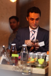 Rohan Bhardwaj trying out his hand at making a Grant's whisky cocktail